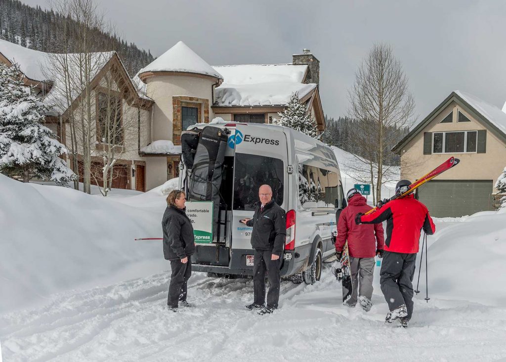 Summit Express Vans Winter with skiers.jpg